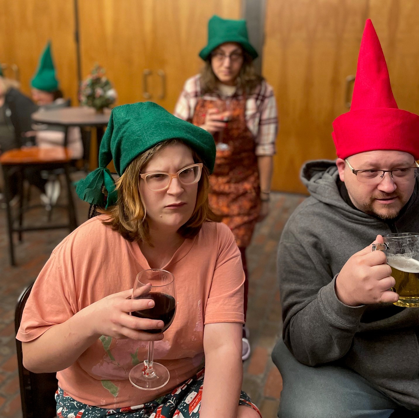 Gnomes drinking and looking irked