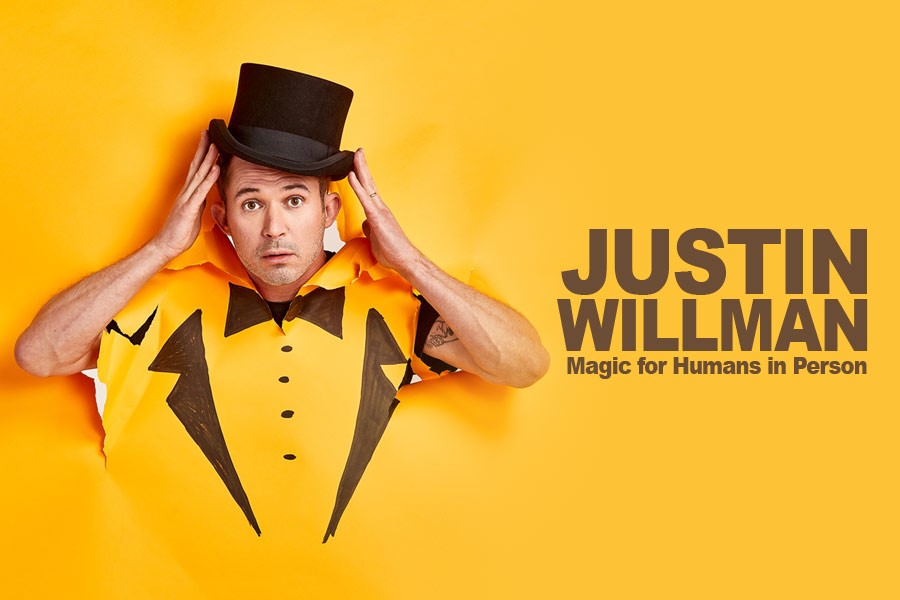 Justin Wilman Magic for Humans in person with man in yellow tuxedo t shirt and black top hat