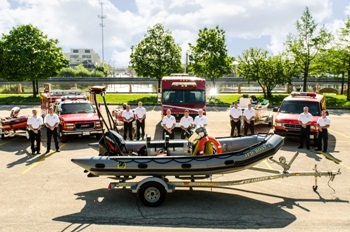 Dive Team with Boat in Front sized for web 